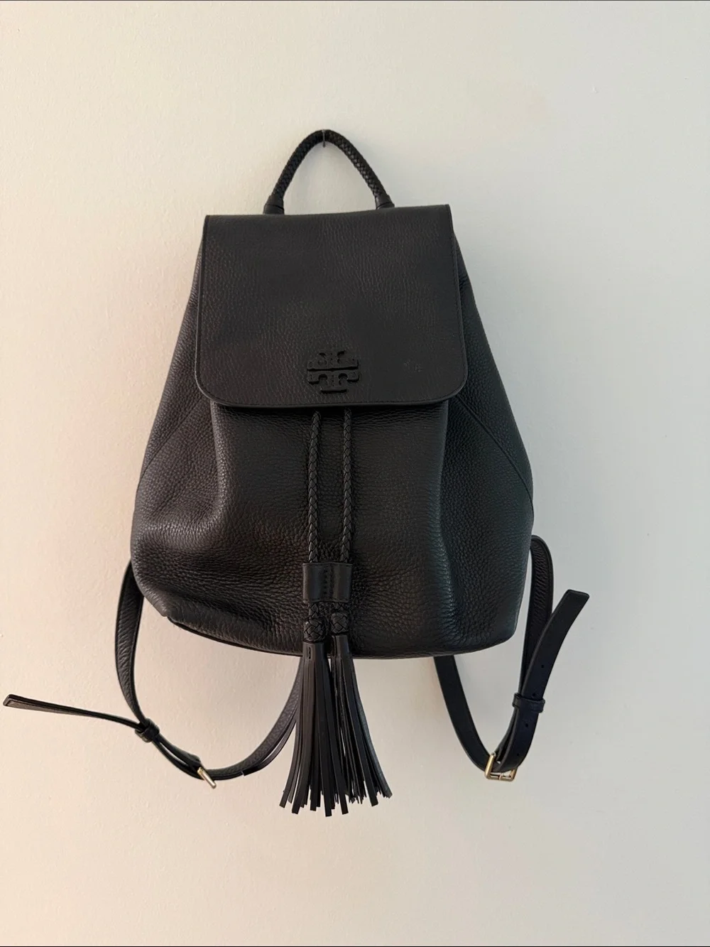 Tory Burch Black Pebbled Leather Tassel Flap Backpack